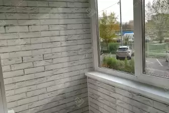 Отделка балкона и установка потайного люка