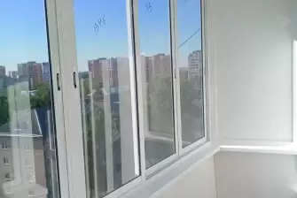 Остекление балкона и отделка стен