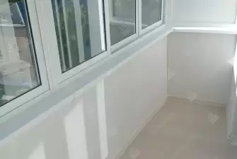 Остекление балкона и отделка стен