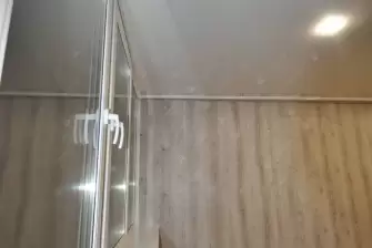 Отделка балкона под ключ с теплым остеклением ПВХ Рехау