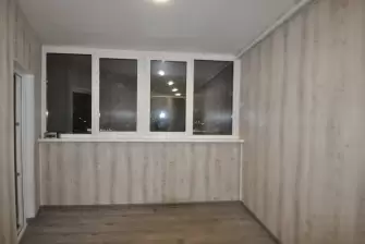 Отделка балкона под ключ с теплым остеклением ПВХ Рехау