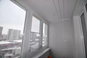 Теплое остекление балкона Сапожок окнами ПВХ Рехау